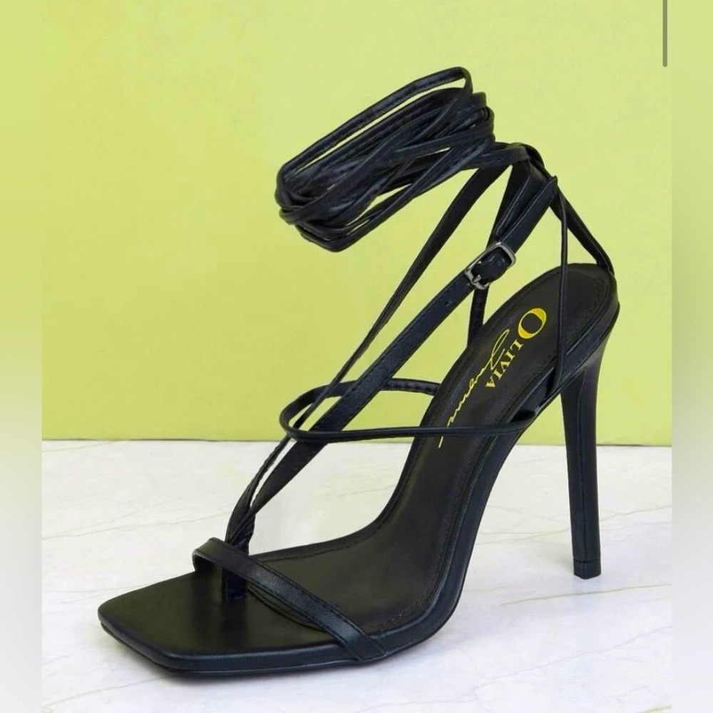 Black strap heels never worn.